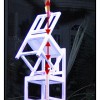 This Photo of a Peking Acrobat Balanced on One Hand a Top Stacked Chairs Models Center of Mass. The acrobat is able to balance on one hand on top of stacked chairs because her center of mass lines up with the center of mass of the chairs which falls within the foundation of the bottom chair.