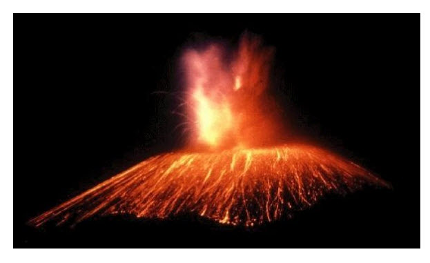 A picture of a volcano erupting at night.Fire is shooting upward from the opening and hot lava is pouring down the sides of the volcano.